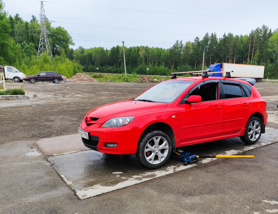 Балансировка передних колес — Mazda 3 (1G) BK