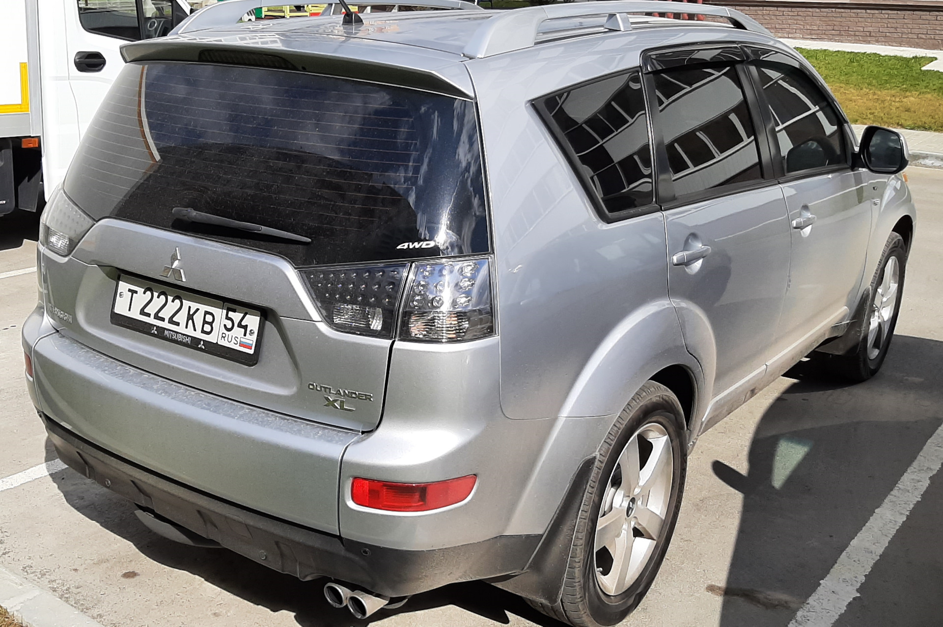 Mitsubishi outlander xl 4wd. Mitsubishi Outlander XL II 3.0 4wd. Наклейка 4wd на Митсубиси Аутлендер. Наклейка 4wd на Митсубиси Аутлендер 3. Наклейки 4вд на Митсубиси Аутлендер.