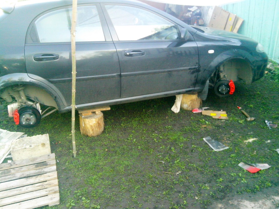 Суппорта в красный — Chevrolet Lacetti 5D, 1,6 л, 2008 года | тюнинг ...