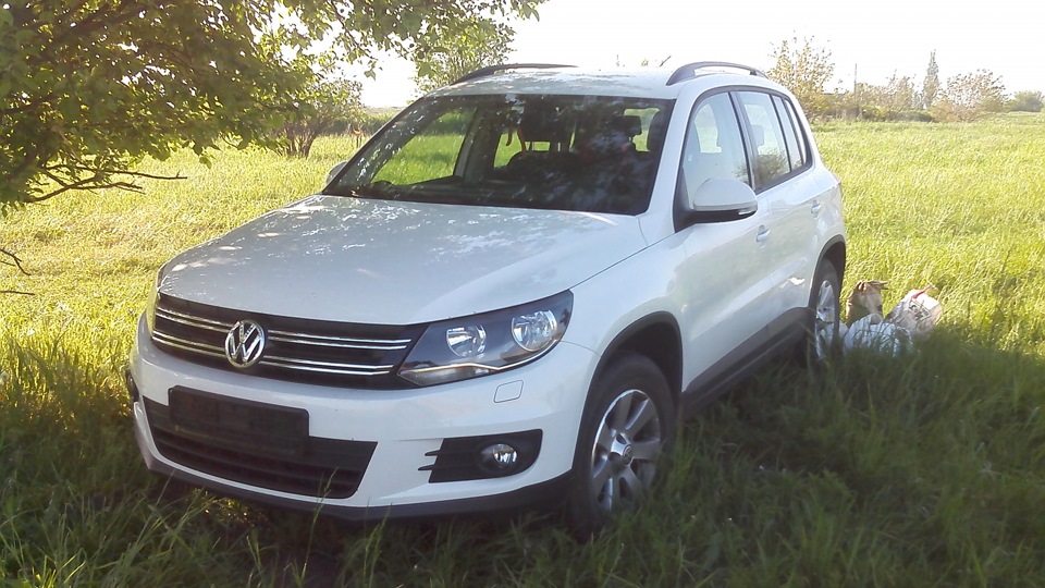 Volkswagen Tiguan i 2012. Фольксваген Тигуан 1. Volkswagen Tiguan Рестайлинг 2012. Фольксваген Тигуан 2013 серебристый.