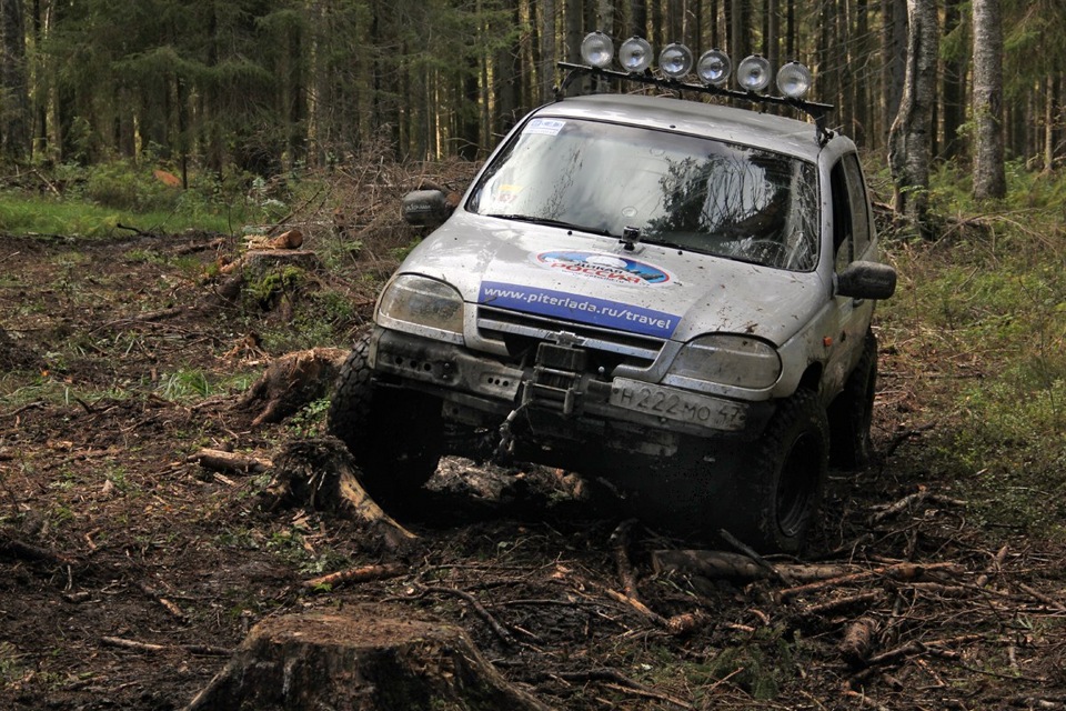 Нива шевроле на бездорожье. Шеви Нива off Road. Нива Шевроле офф роуд. Нива Шевроле для бездорожья. Шевроле Нива трофи.