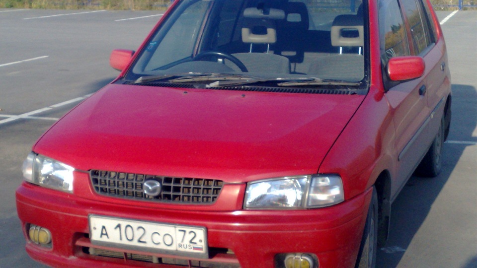Mazda Demio (1G) 1.3 бензиновый 1999 | красная на DRIVE2