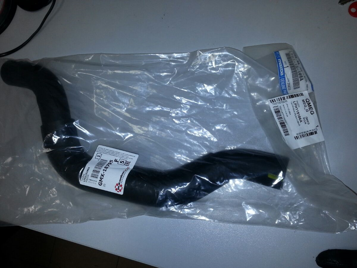 трубка радиатора верхняя мазда 6. Zl0115186a. патрубок радиатора нижний мазда титан. верхний патрубок радиатора mazda tribute 3. патрубок радиатора gates 22507.