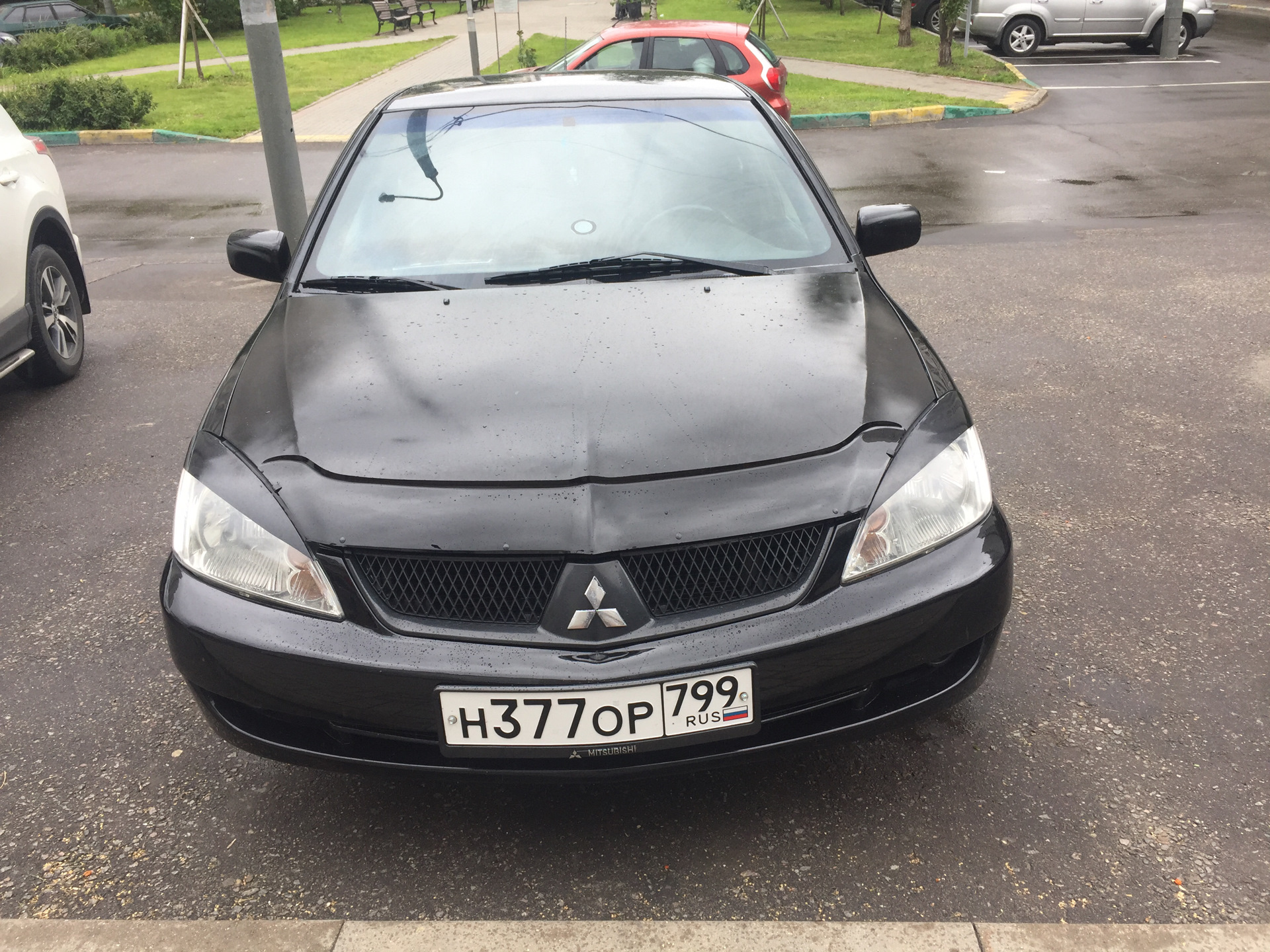 Дефлектор капота лансер. Дефлектор капота Mitsubishi Lancer 9. Дефлектор капота Митсубиси Лансер 9. Черный Лансер 9 с дефлектором капота. Митсубиси Лансер 9 с дефлекторами.