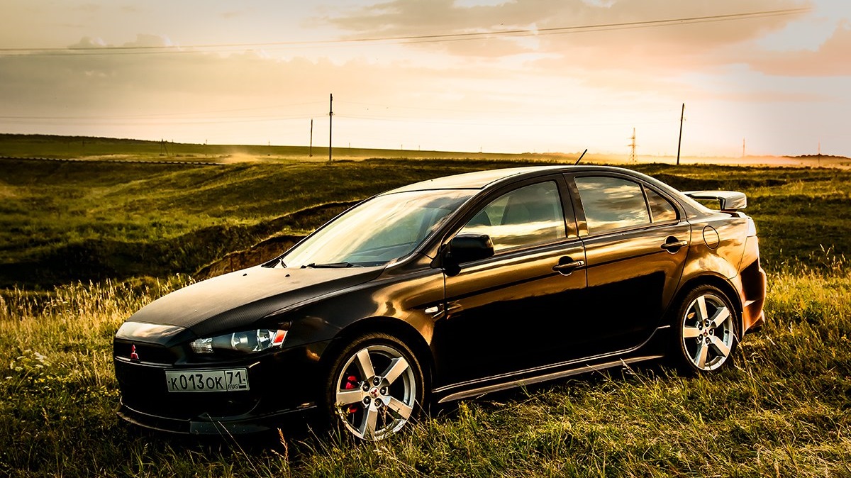 Mitsubishi форум. Mitsubishi Lancer Club. Митсуба на рабочий стол. Митсубиси Лансер с прицепом. Mitsubishi Lancer 10 на фоне восхода солнца.