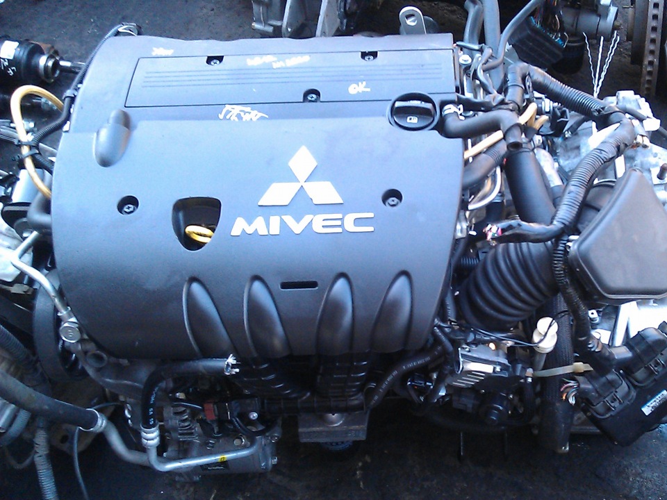 Mitsubishi outlander 4 двигатель. Mitsubishi 2.0 4b11. Митсубиси Аутлендер мотор 4в12. Митсубиси Аутлендер 2005 двигатель. 4b12 MIVEC.