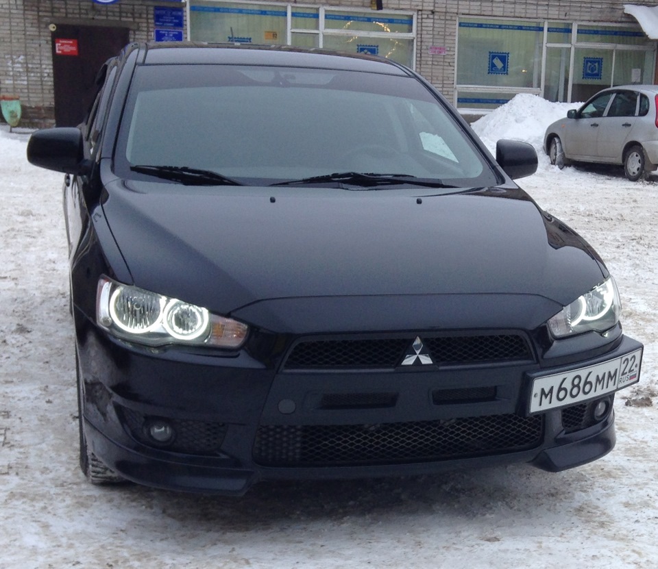 Ангельские глазки лансер. Ангельские глазки на Митсубиси Лансер 10. Mitsubishi Lancer 10 ангельские глазки. Lancer Evolution 10 ангельские глазки. Mitsubishi Lancer x ангельские глазки.