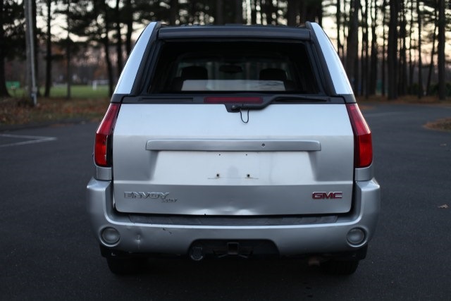 Manually tailgate release gmc envoy xuv