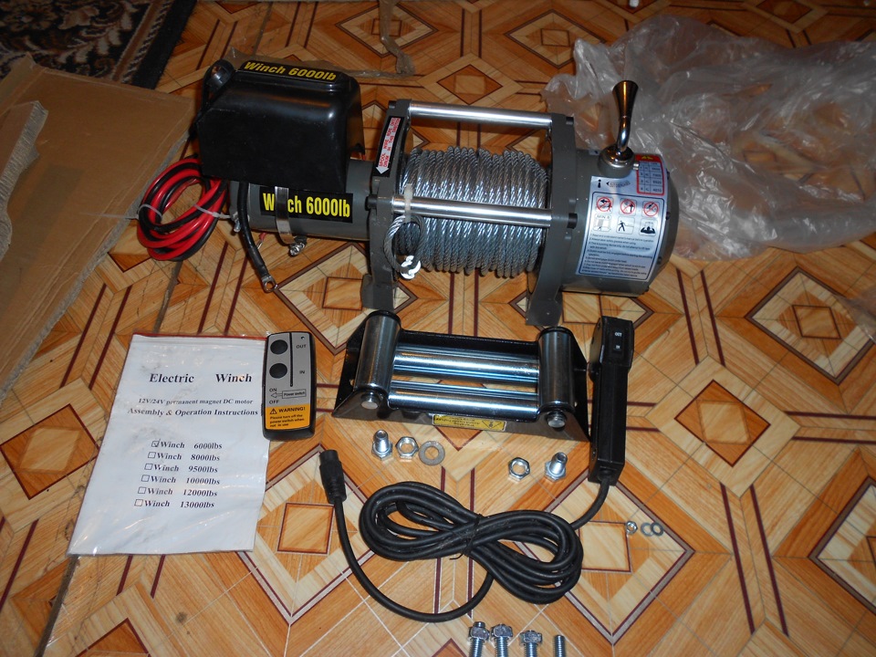 Лебедка автомобильная electric winch. Лебедка электрик Винч 6000. Electric winch 6000 12v. Лебёдка электрическая 12v 6000 lbs. MW 6000 A 12v лебедка автомобильная электрическая.