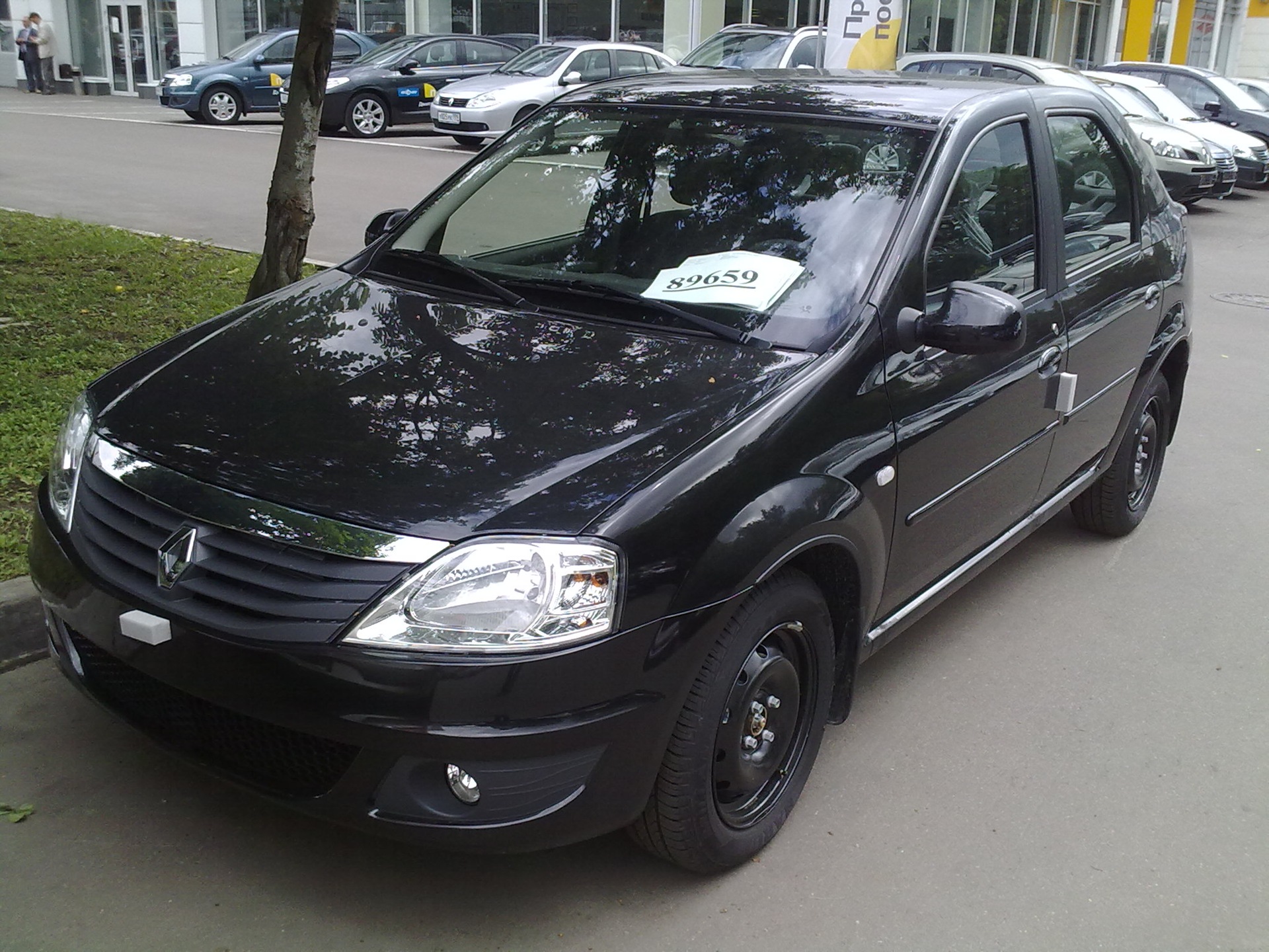 Черный логан двадцатого века. Рено Логан 1 черный. Renault Logan 1 Black. Черный Рено Логан SR 2007. Рено Логан 1 черные колпаки.