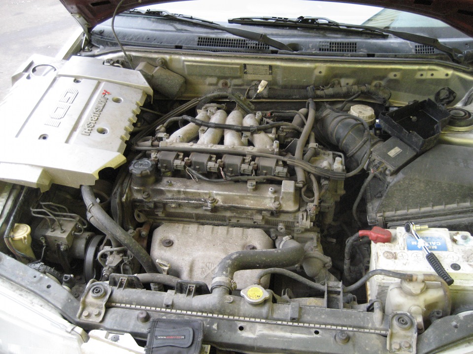 Мицубиси каризма двигатели. Двигатель Митсубиси 4g93. Двигатель Mitsubishi Galant, 4g93. Мицубиси Галант двигатель 4g93. GDI 1.8 двигатель Мицубиси.