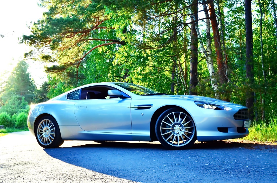 Шины на aston martin. Aston Martin db8. Aston Martin db9 1997. Aston Martin db9 2021. Aston Martin db8 2012.