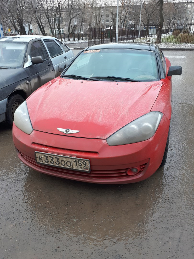 лого Tuscani в крыльях Genesis — Hyundai Coupe (GK), 2 л, 2007 года |  стайлинг | DRIVE2