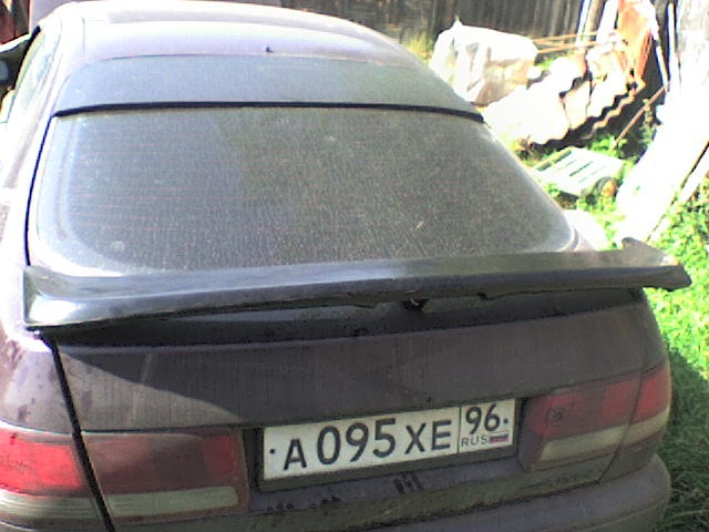 rear window visor and spoiler - Toyota Carina E 16 L 1993