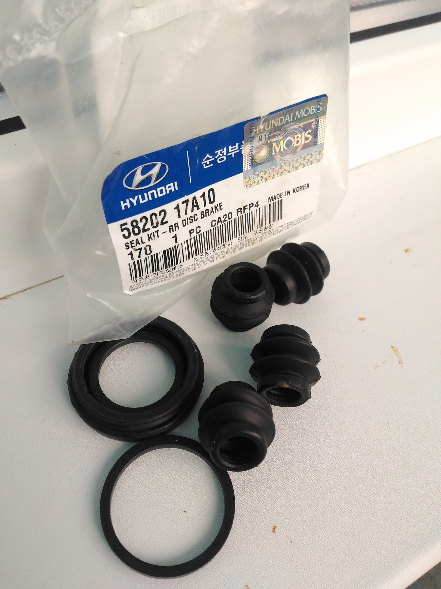 Ремкомплект суппорта хендай элантра 5. Ремкомплект заднего суппорта хендай туссан 2008. 58102-2ea10. Ремкомплект суппорта туксон. Ремкомплект заднего суппорта туксон 04.