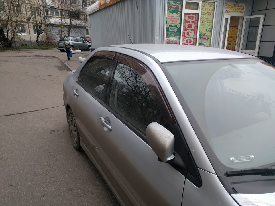 Ветровики на авто митсубиси лансер 9
