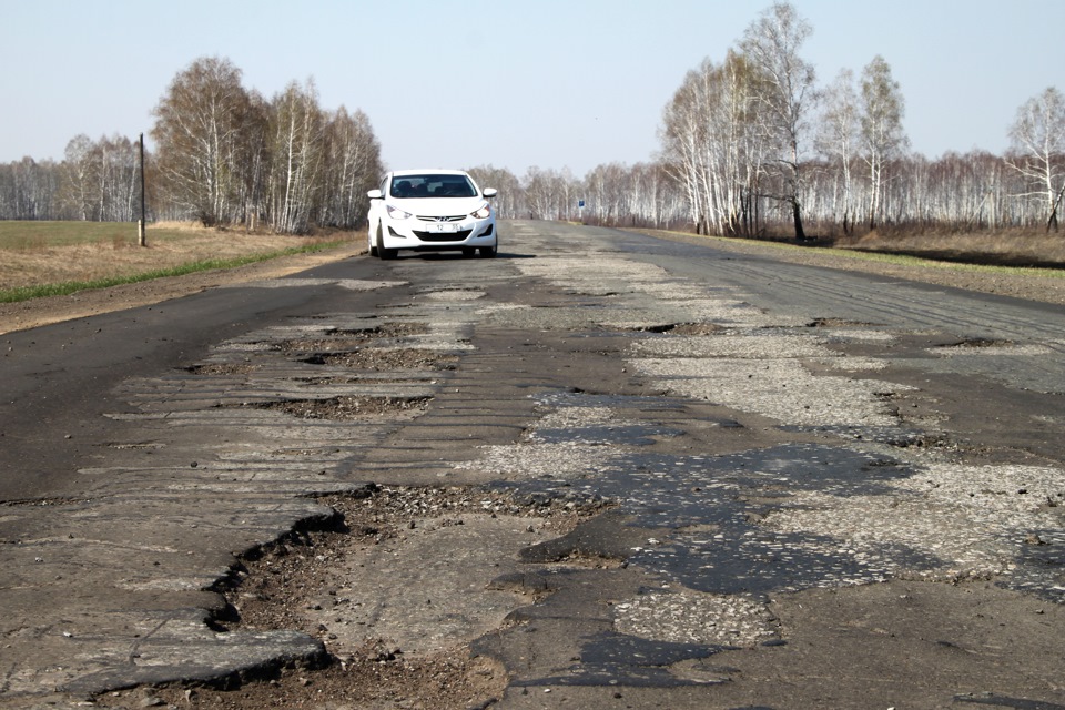 Никакая то была дорога. Российские дороги. Разбитая трасса. Разбитые дороги России. Разбитые дороги в России 2023.