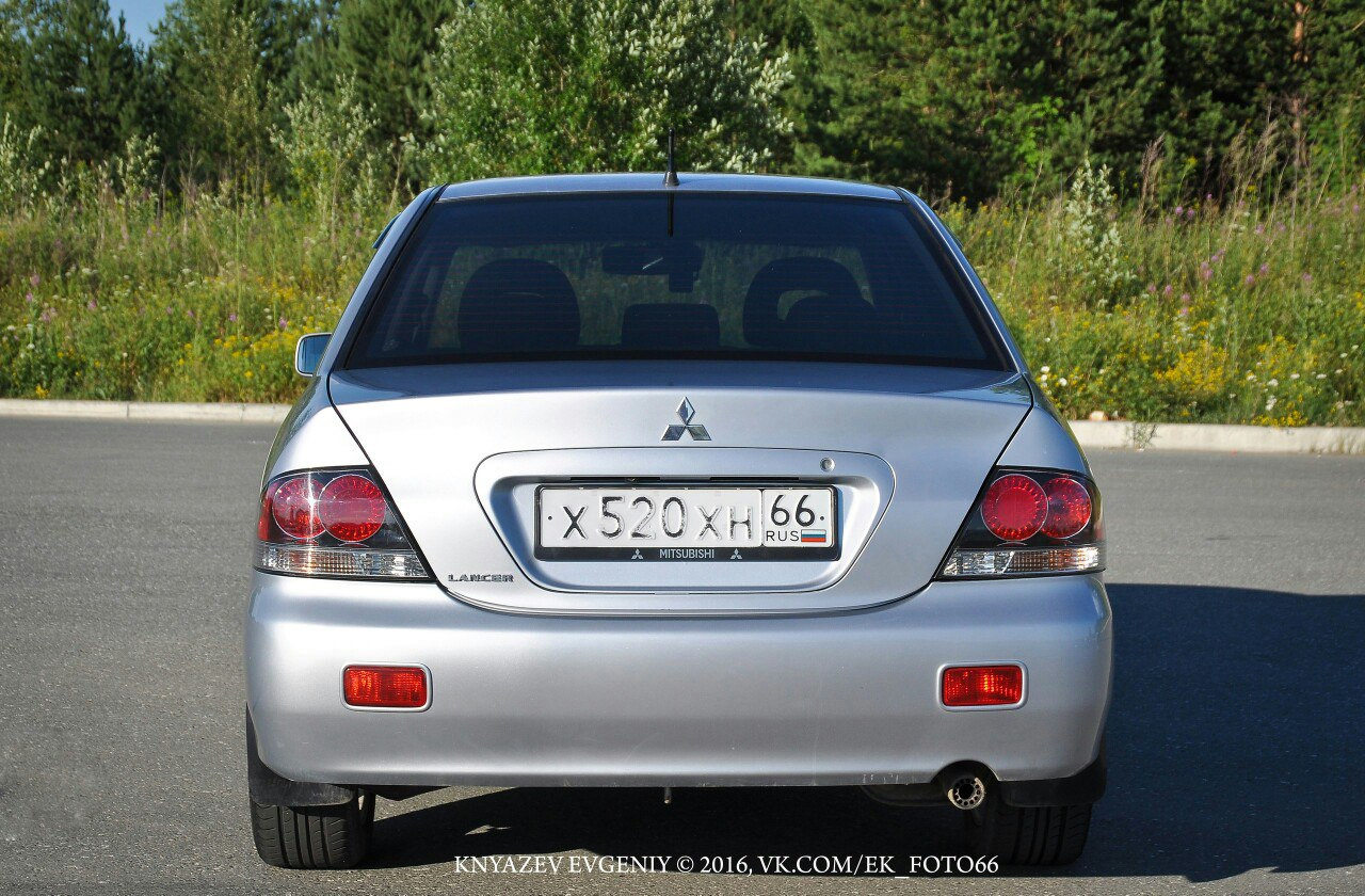 Задние мицубиси лансер 9. Mitsubishi Lancer 9 зад. Lancer 9 сзади. Lancer 9 седан. Mitsubishi Lancer 1.5 2007 сзади.