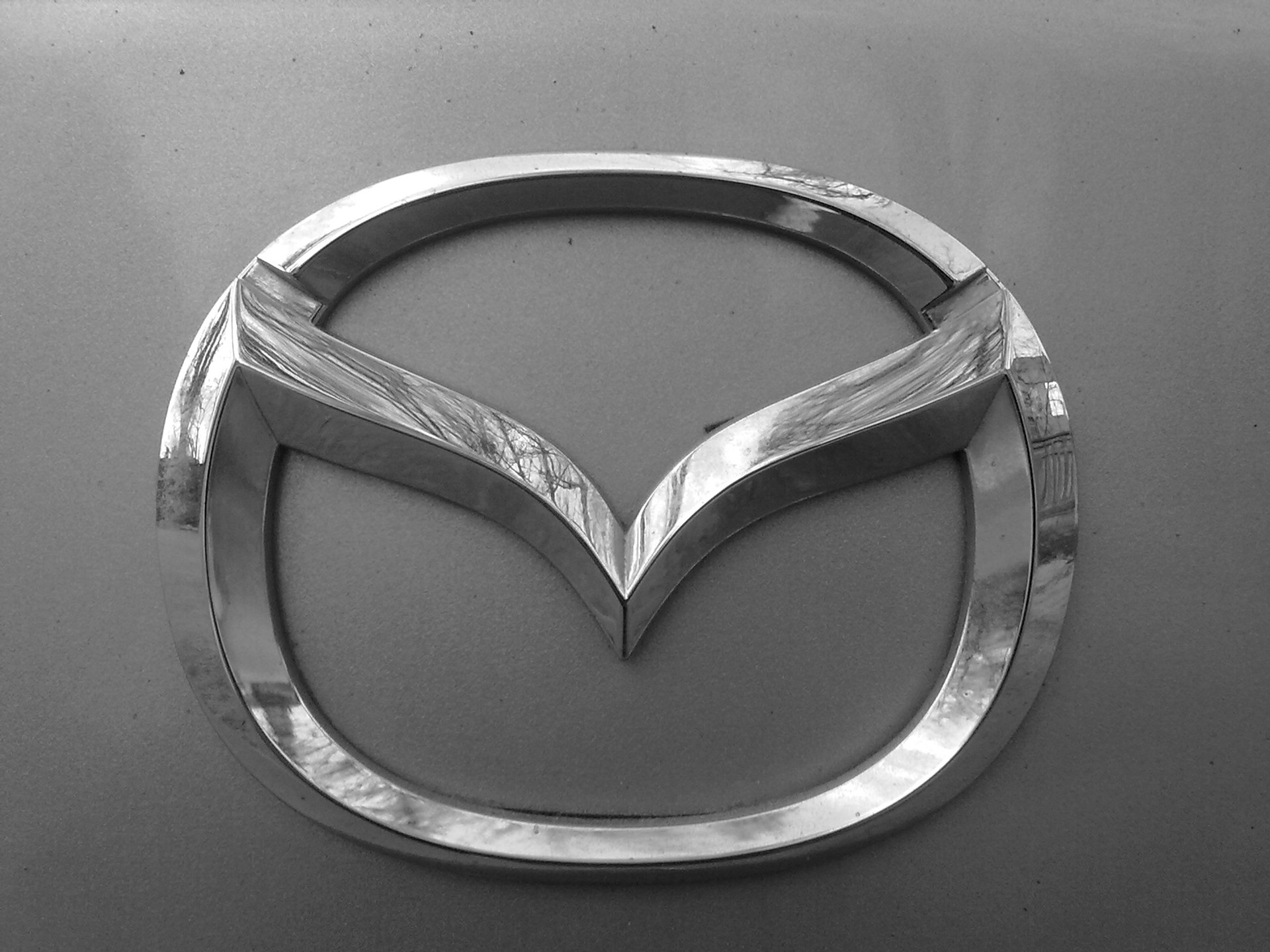 Что означает mazda. Значок Мазда 626. Мазда 6 626. Mazda 626 логотип.