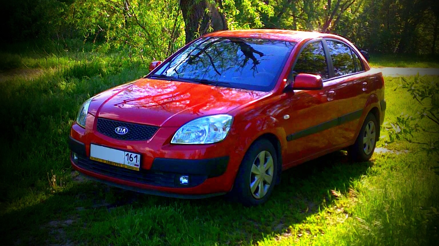 KIA Rio (2G) 1.4 бензиновый 2007 | tropic red на DRIVE2