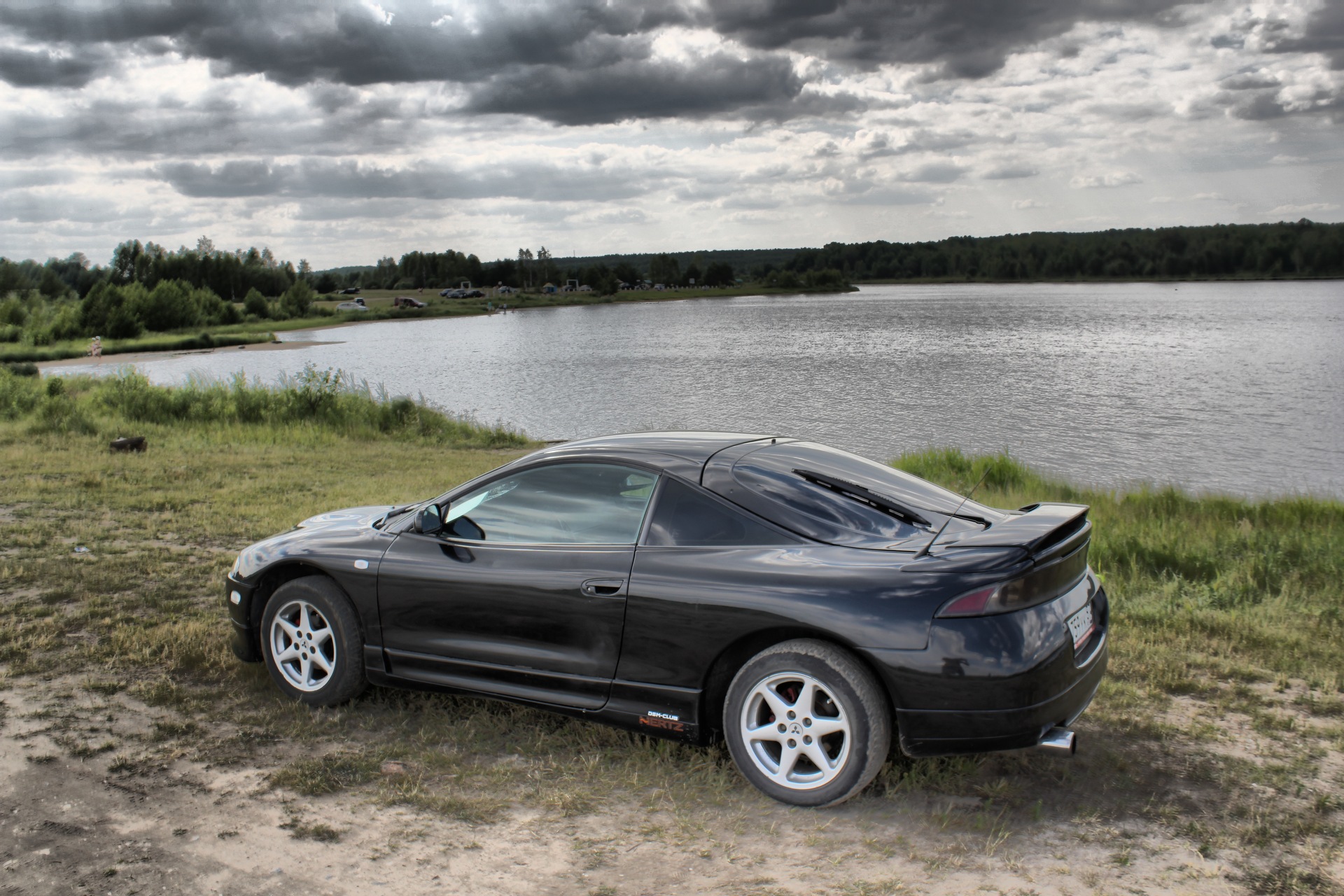 Mitsubishi eclipse отзывы. Mitsubishi Eclipse 2003. Mitsubishi Eclipse RS 2g. Митсубиси Эклипс черный. Mitsubishi Eclipse 1998.