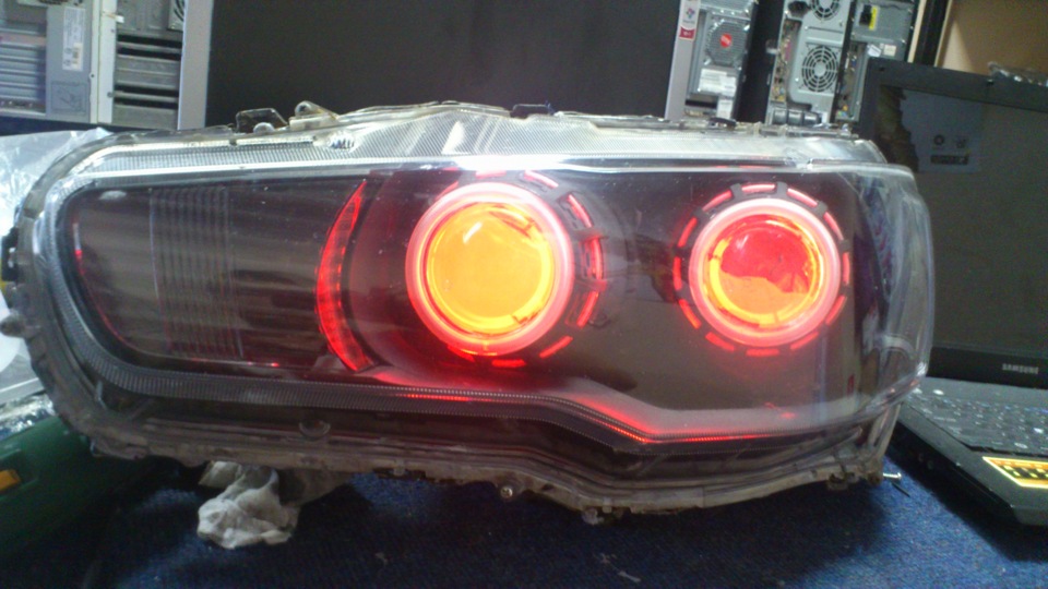 Установка линз мицубиси галант 8. Установка линз лансер 10. Линзы на лансер 10. Митсубиси лансер 10 установка линз. Линзованные фары лансер 10.