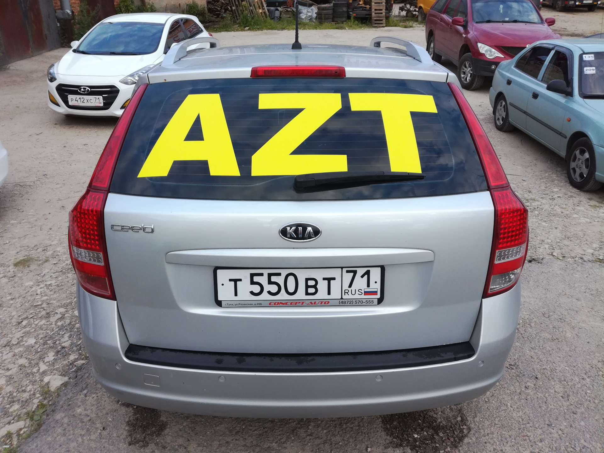 AZT ли другие буквы на заднем стекле) — KIA Ceed SW (1G), 2 л, 2011 года |  другое | DRIVE2