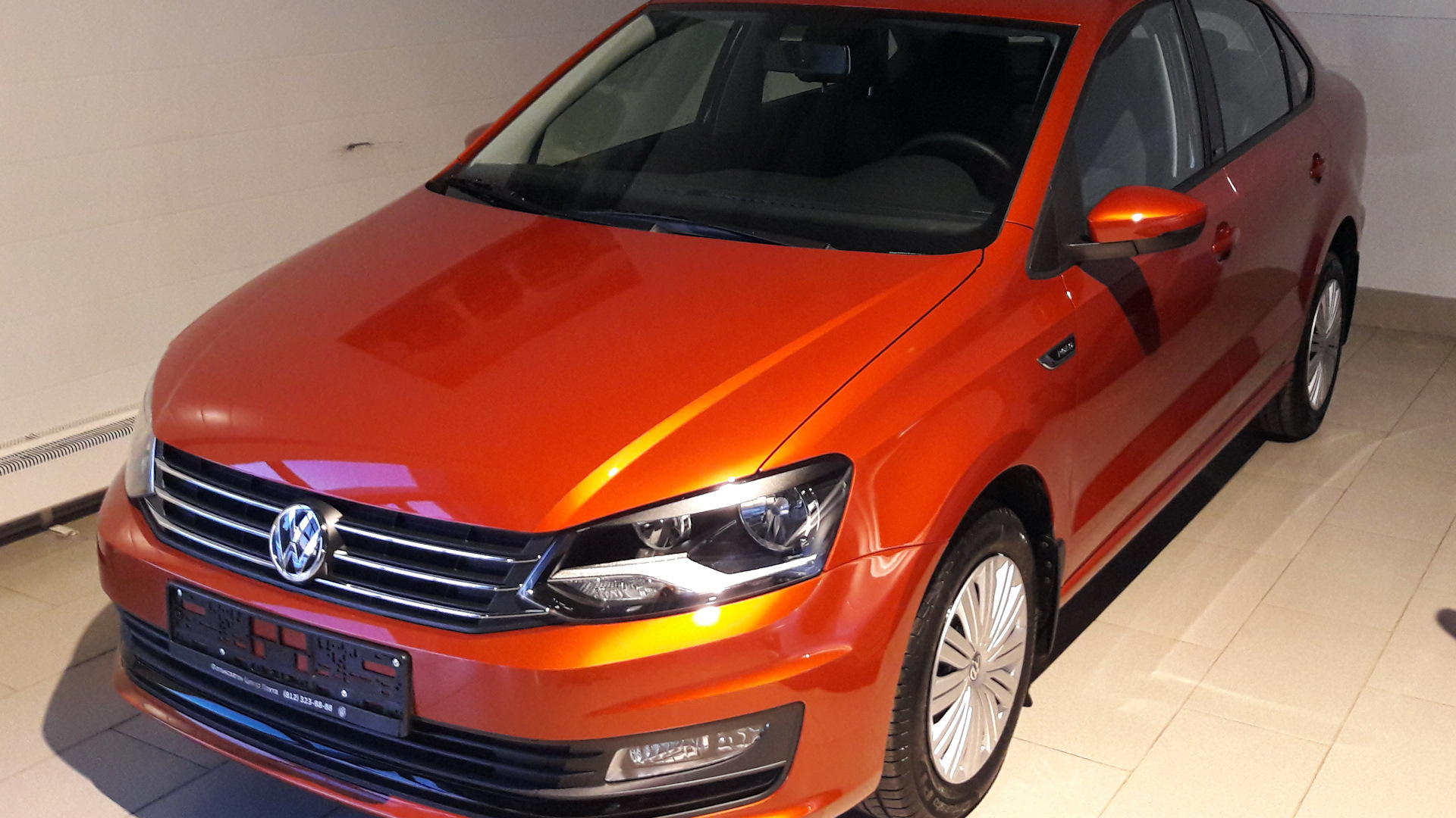 Volkswagen Polo Sedan 1.6 бензиновый 2017 | красно-оранжевый металик на  DRIVE2