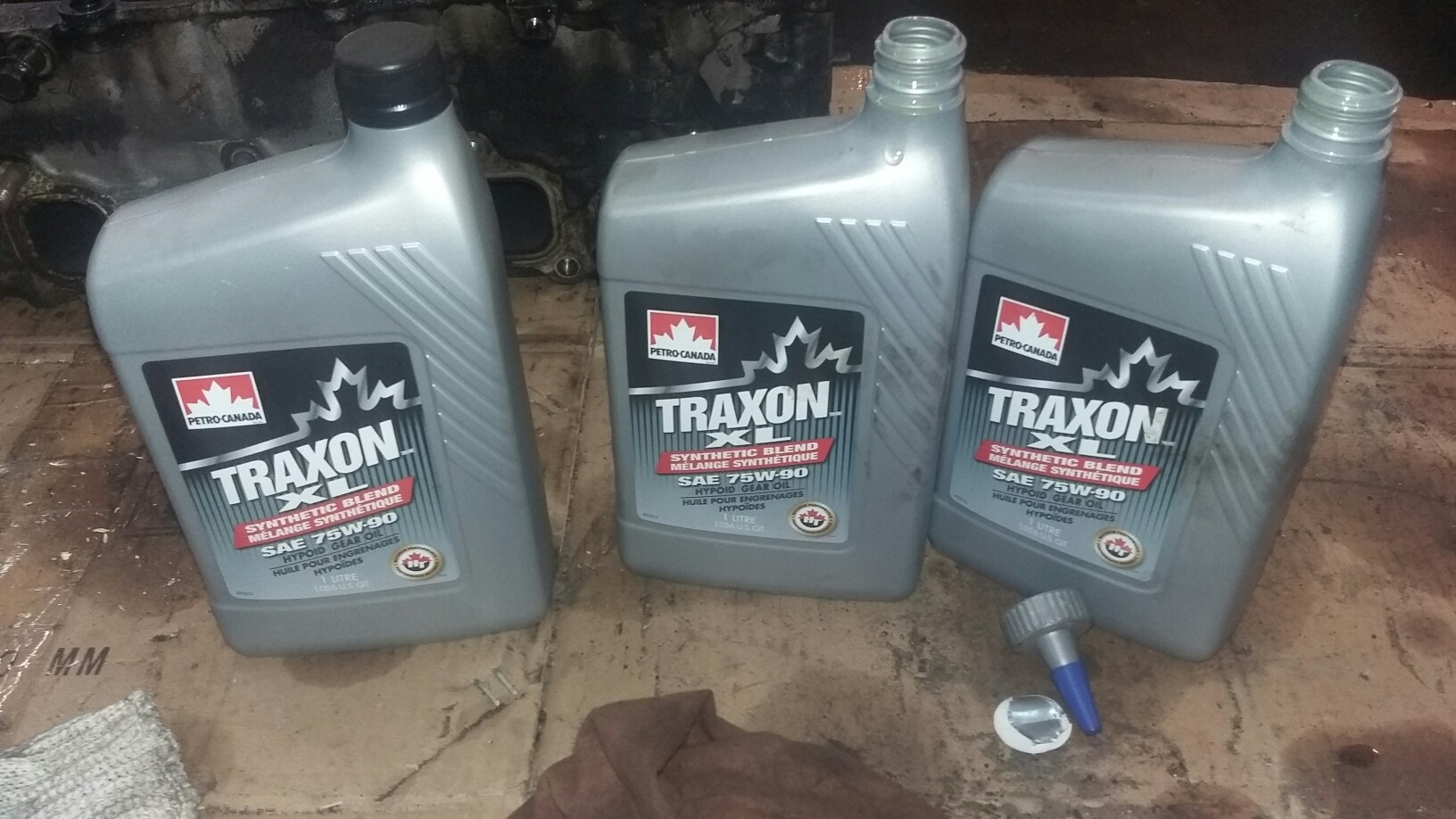 Масло акпп джимни. Isuzu Trooper масло в раздатку. Petro-Canada Traxon Synthetic 75w-90. Petro Canada Traxon XL Synthetic Blend 75w-90 бочка.