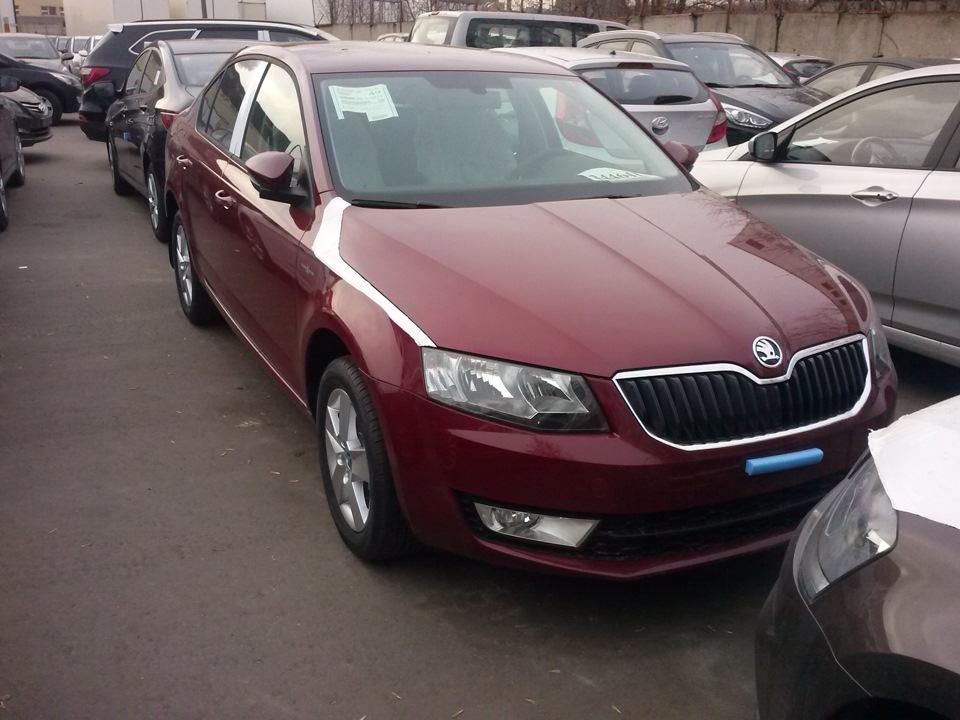 Красный Ruby Skoda Rapid