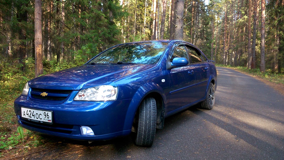 Шевроле в крыму. Chevrolet Lacetti седан голубой drive2. Синий Шевроле Лачетти седан чёрная решетка. Мицубиси Лачетти седан синий.