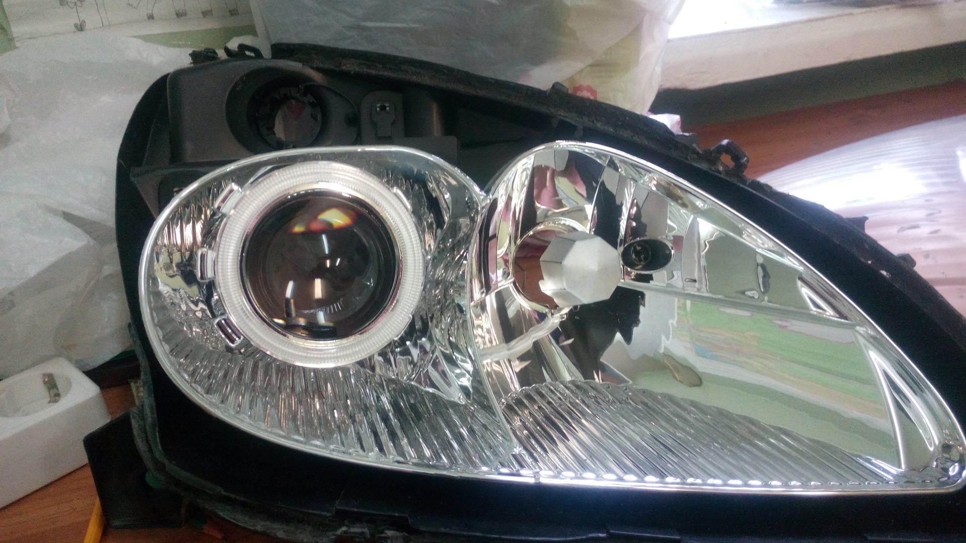 одв завод рецептурной оптики лого. 5 5800k bi-led линза. зрение. оптика тюмень мельникайте. линза 20 диоптрий.