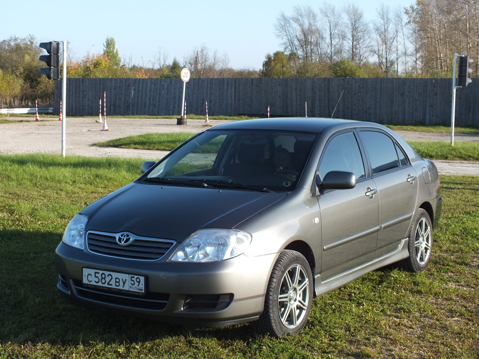 Королла 2006 1.6. Королла е120. Toyota Corolla 120. Toyota Corolla 2006. Королла 120 2006.