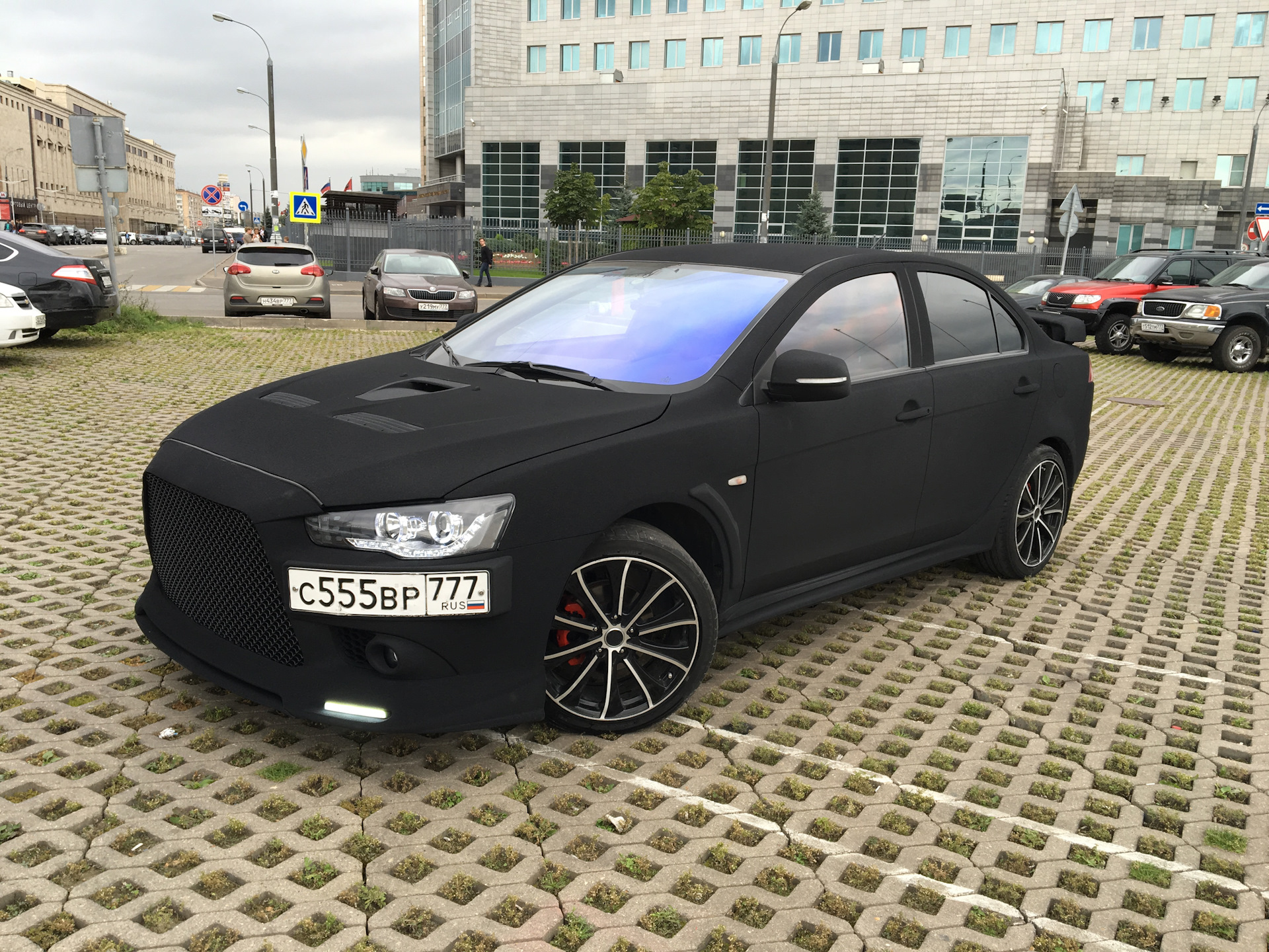 Jevin x black. Митсубиси Лансер 10 черно матовый. Mitsubishi Lancer 10 черный матовый. Митсубиси Лансер 10 матовый. Лансер 10 черный матовый.