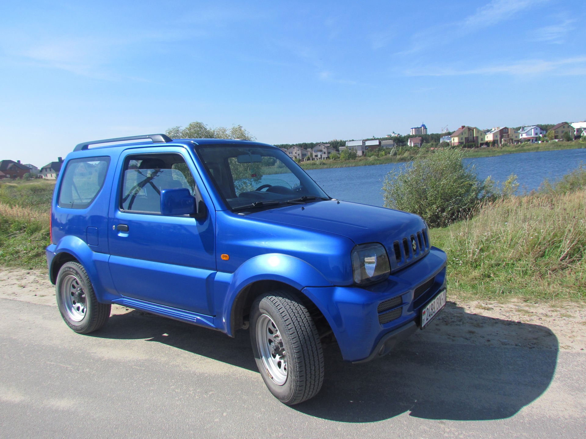 Купить джимни в приморском крае. Suzuki Jimny синий. Сузуки Джимни 2008 синий. Suzuki Jimny 1.3. Suzuki Jimny 1998 голубая.