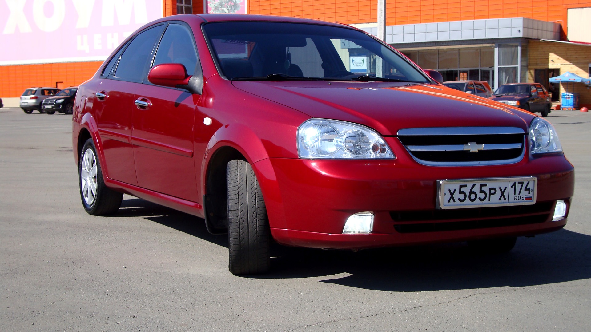 Лачетти седан 1.6. 70u Red Rock Лачетти. Chevrolet Lacetti Red Rock. Шевроле Лачетти седан 2008 бордова. Chevrolet Lacetti хэтчбек 1.6 цвет Red Rock.