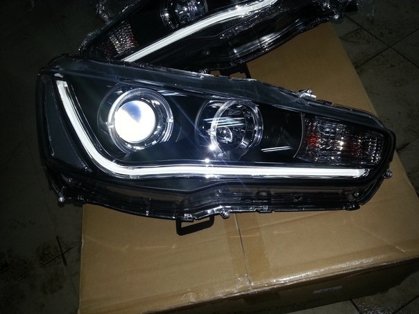 Блок ангельских глазок. Оптика лансер 10. Линзы на лансер 10. Птф с ангельскими глазками lancer x. Фары mitsubishi lancer 10.