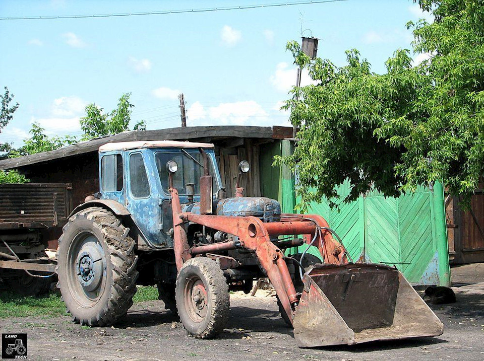 Трактор с куном фото