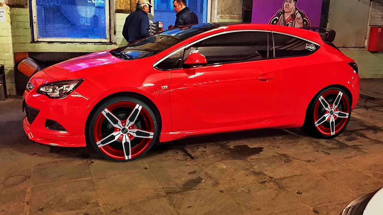Опель j разболтовка. Opel Astra j GTC красная. Opel Astra j GTC r21. Opel Astra GTC H красная на дисках. Opel Astra j GTC красный на 20 дисках.