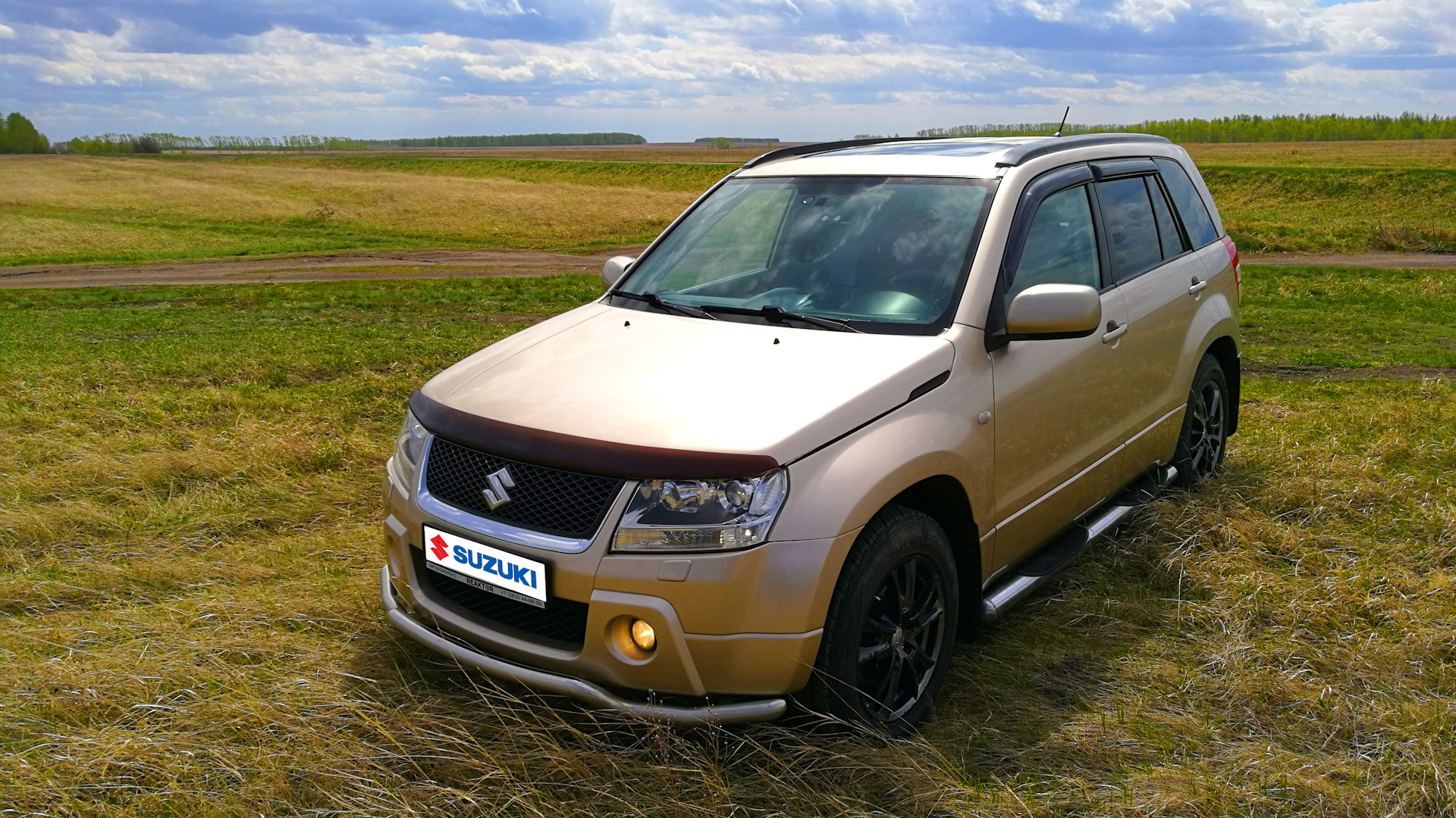 Сузуки гранд витара официальные дилеры. Suzuki Vitara. Гранд Витара окрас. Сузуки топ. Suzuki Grand Vitara (2g) тюнинг.