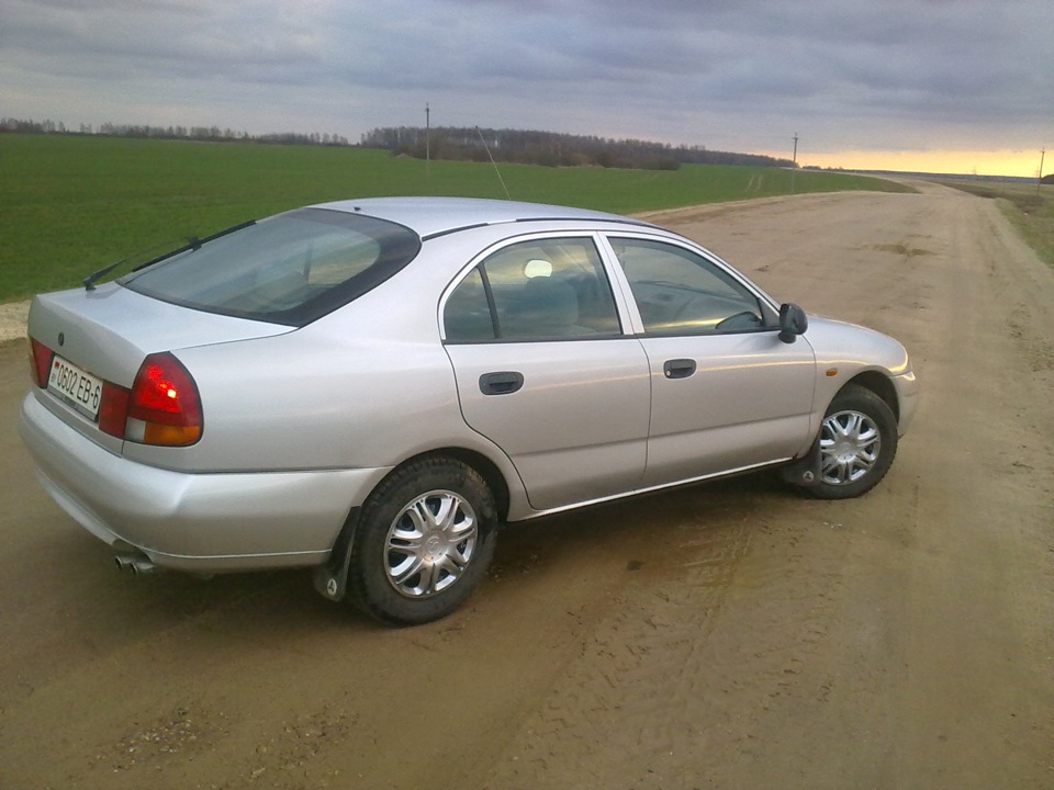 =) — Mitsubishi Carisma