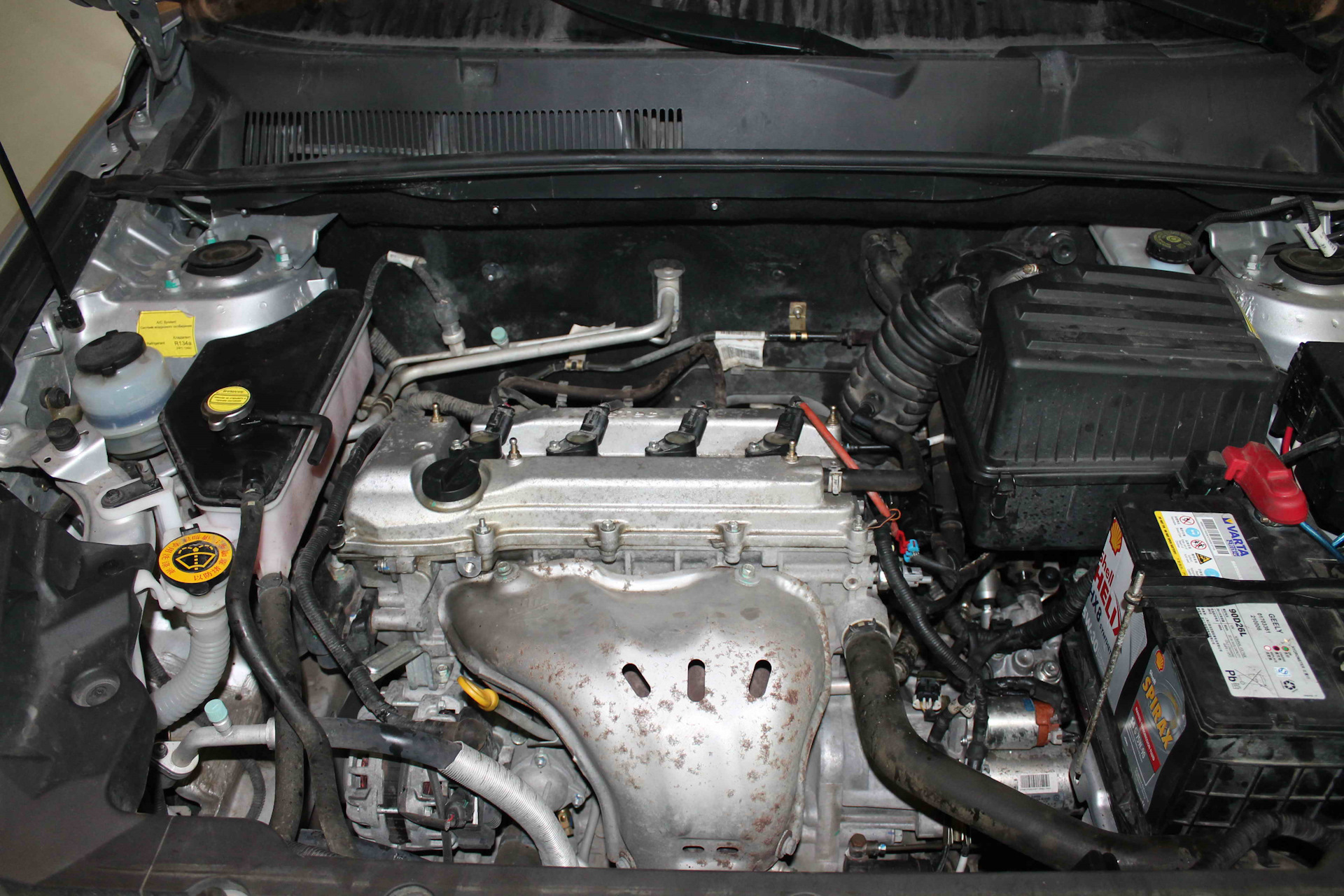 Двигатель geely emgrand x7. Двигатель Geely Emgrand x7 2.0. Двигатель с коробкой Джили Эмгранд х7. Двигатель Джили Эмгранд x7. Geely Emgrand x7 подкапотка.