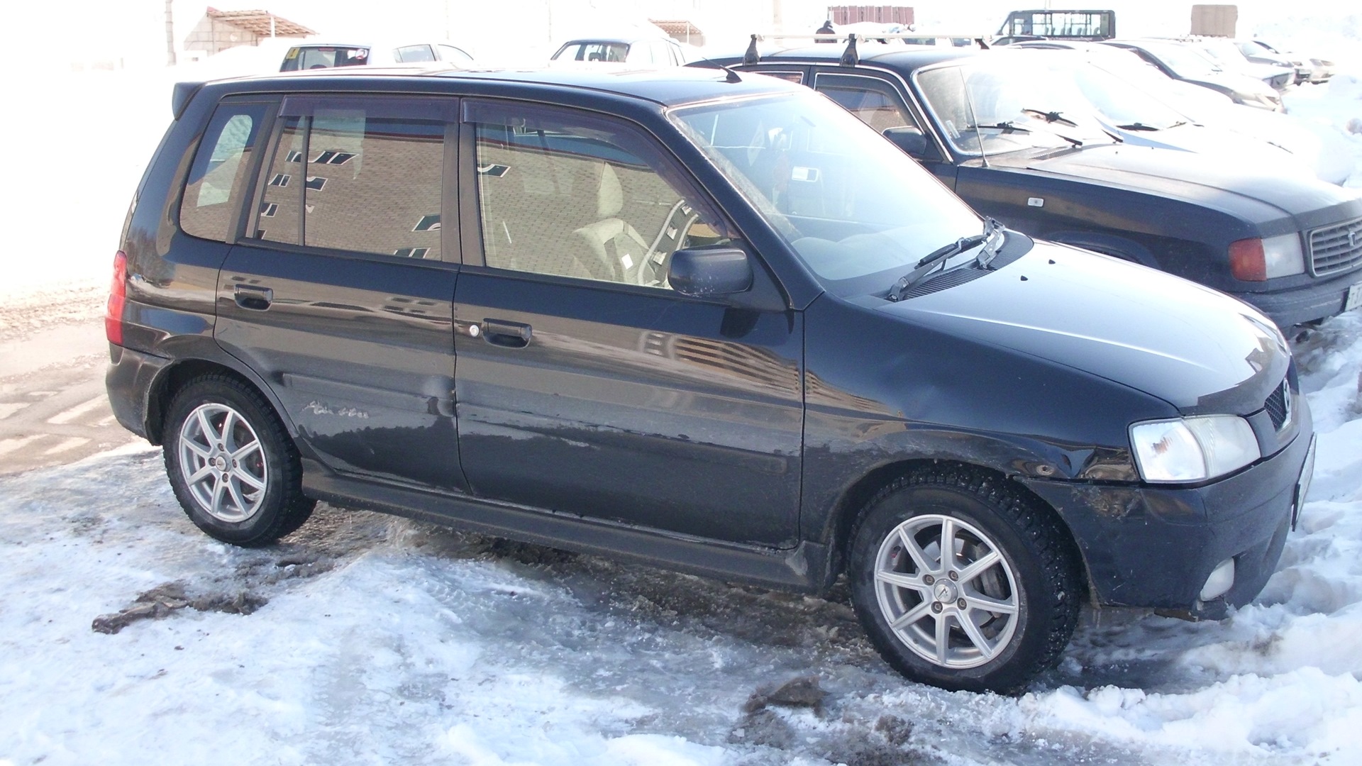 Mazda Demio (1G) 1.5 бензиновый 2001 | Черная бестия на DRIVE2