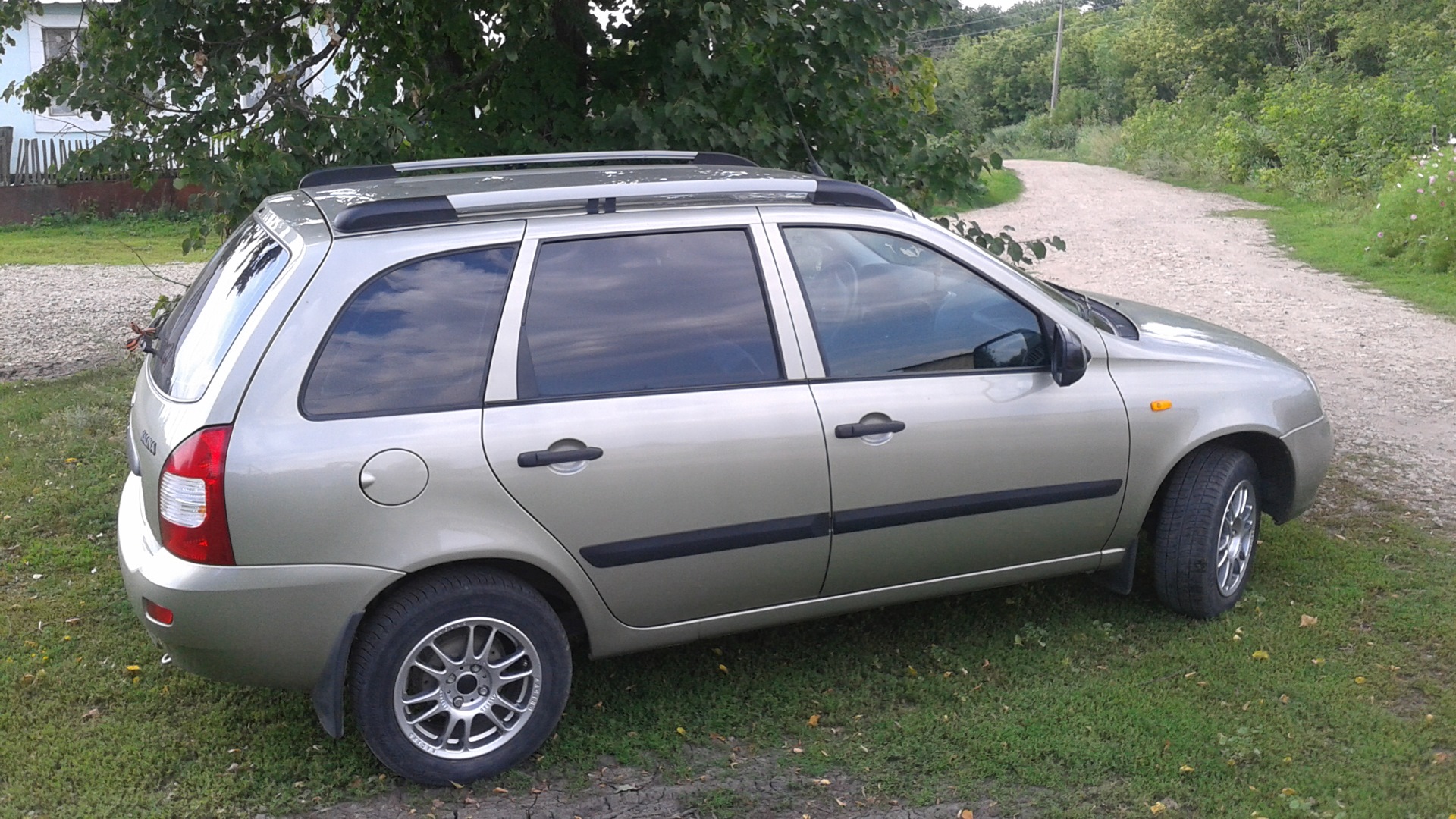 Lada Калина универсал 1.6 бензиновый 2012 | серый-базальт на DRIVE2