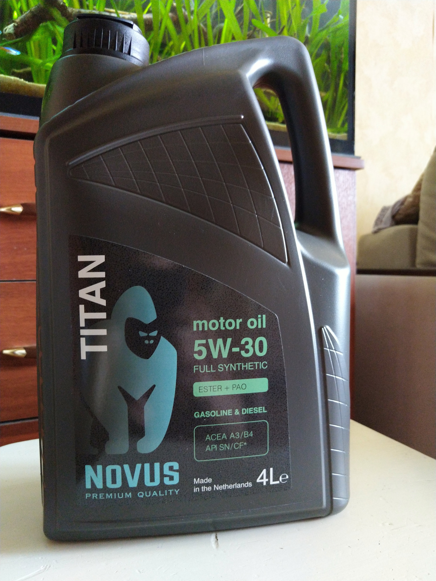 Купить титан 5w30. Novus Titan 5w-30. Моторное масло Титан 5w30. Масло моторное Новус Титан 5w40. Novus Titan 5w-40.