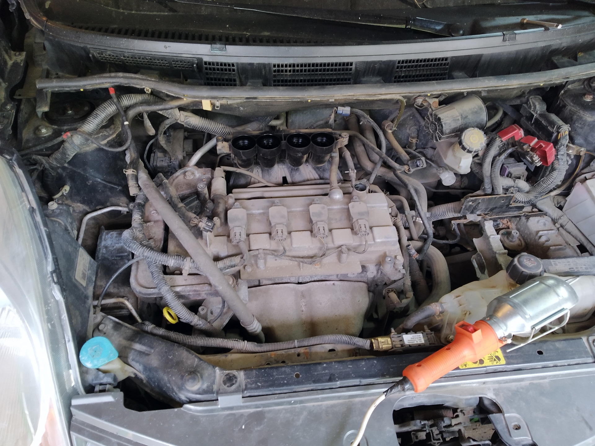 6. 6. 6. замена свечей ниссан ноут 1. свечи nissan note 1.