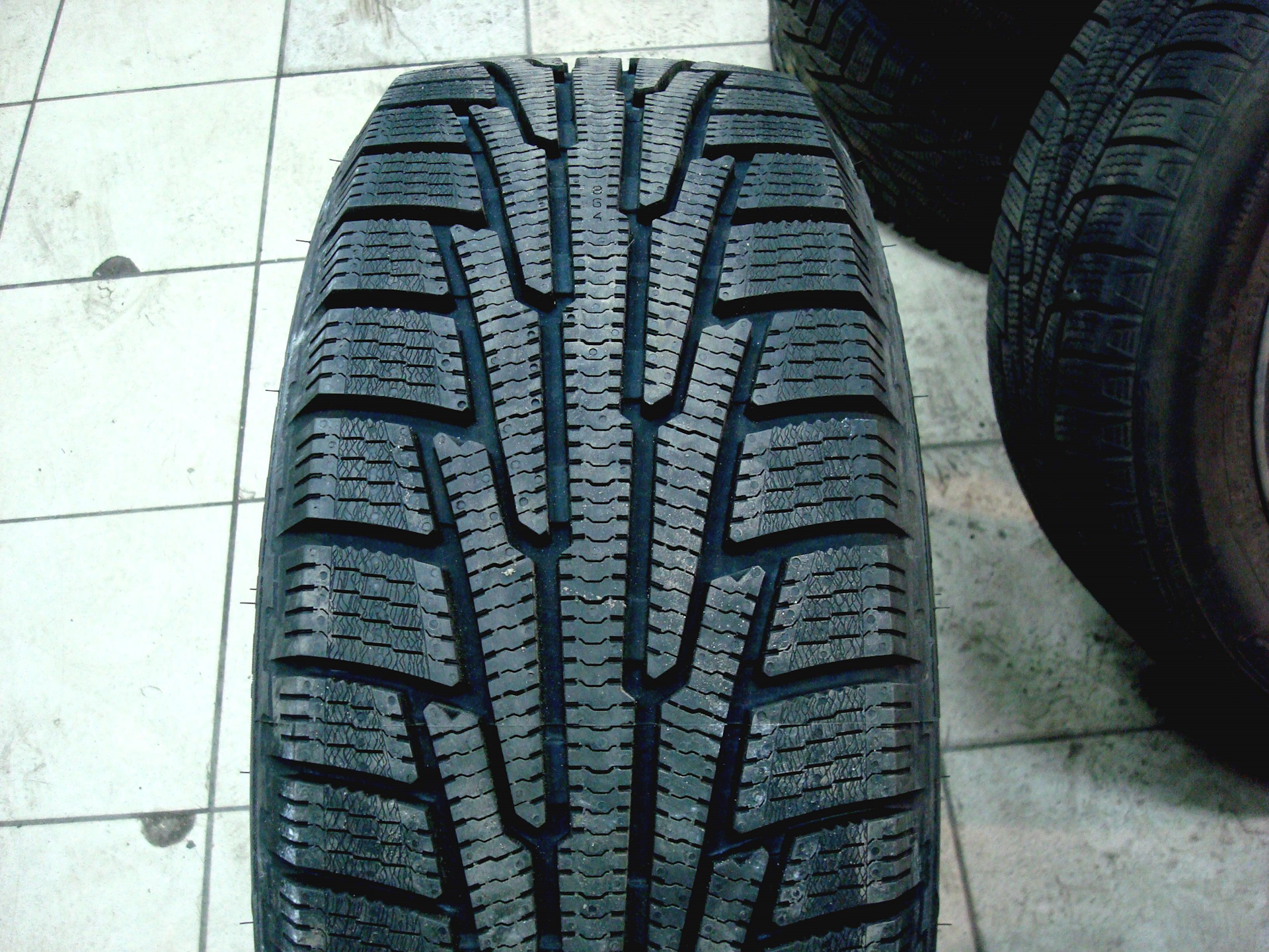 Зимние шины r18 225 65. Nordman rs2. Нокиан rs2. Nordman rs2 SUV. Nokian Tyres Nordman rs2.