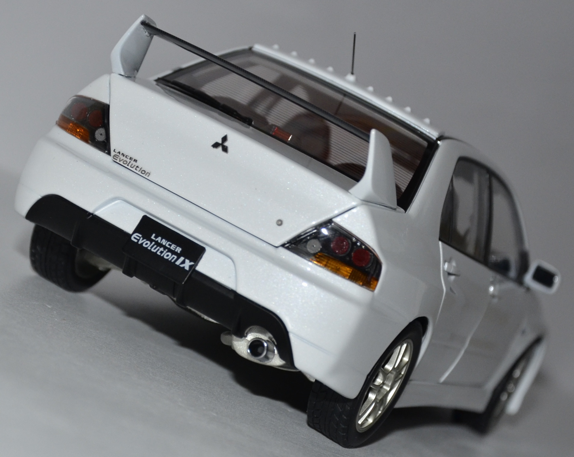 Сделай mitsubishi. 1:18 Lancer EVO. Mitsubishi Lancer Evolution IX GSR 2006. Mitsubishi Lancer Evolution x 10 1:18. 1 18 Mitsubishi Lancer.