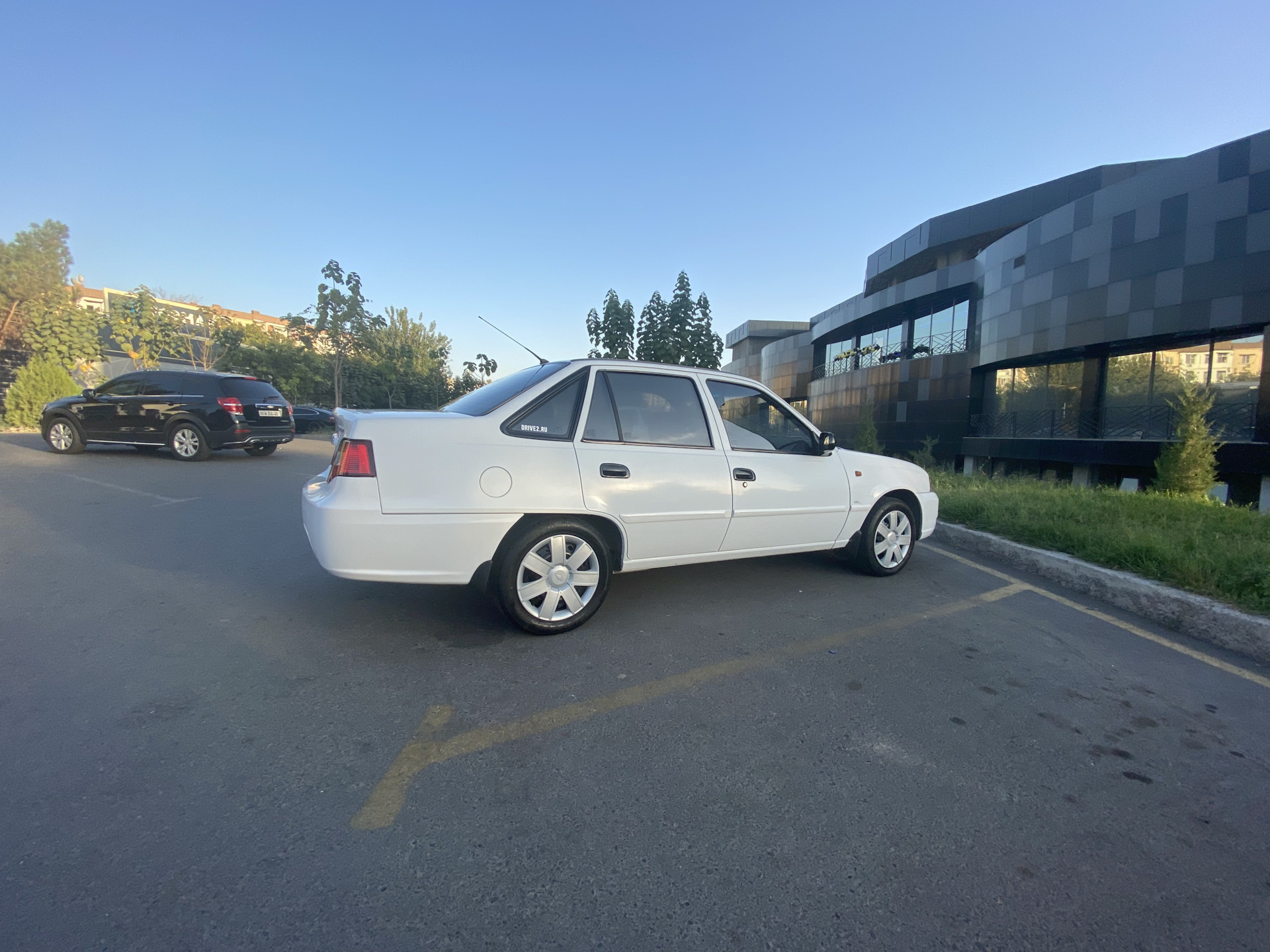 Стикер сбоку. — Chevrolet Nexia (1994), 1,6 л, 2010 года | мойка | DRIVE2