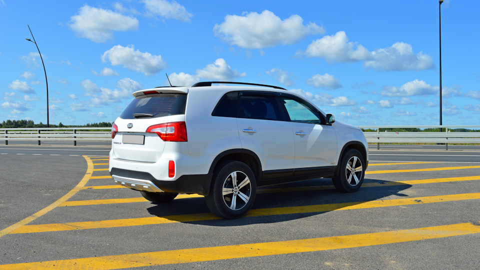 KIA Sorento Белый перламутр - 2,4 л